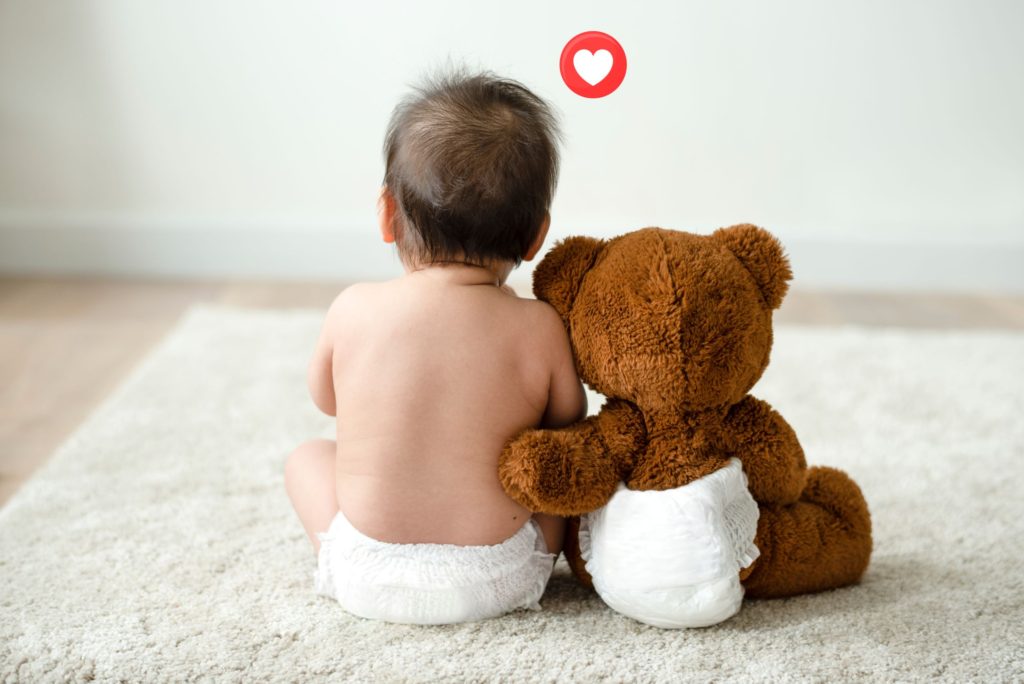 baby with teddy bear